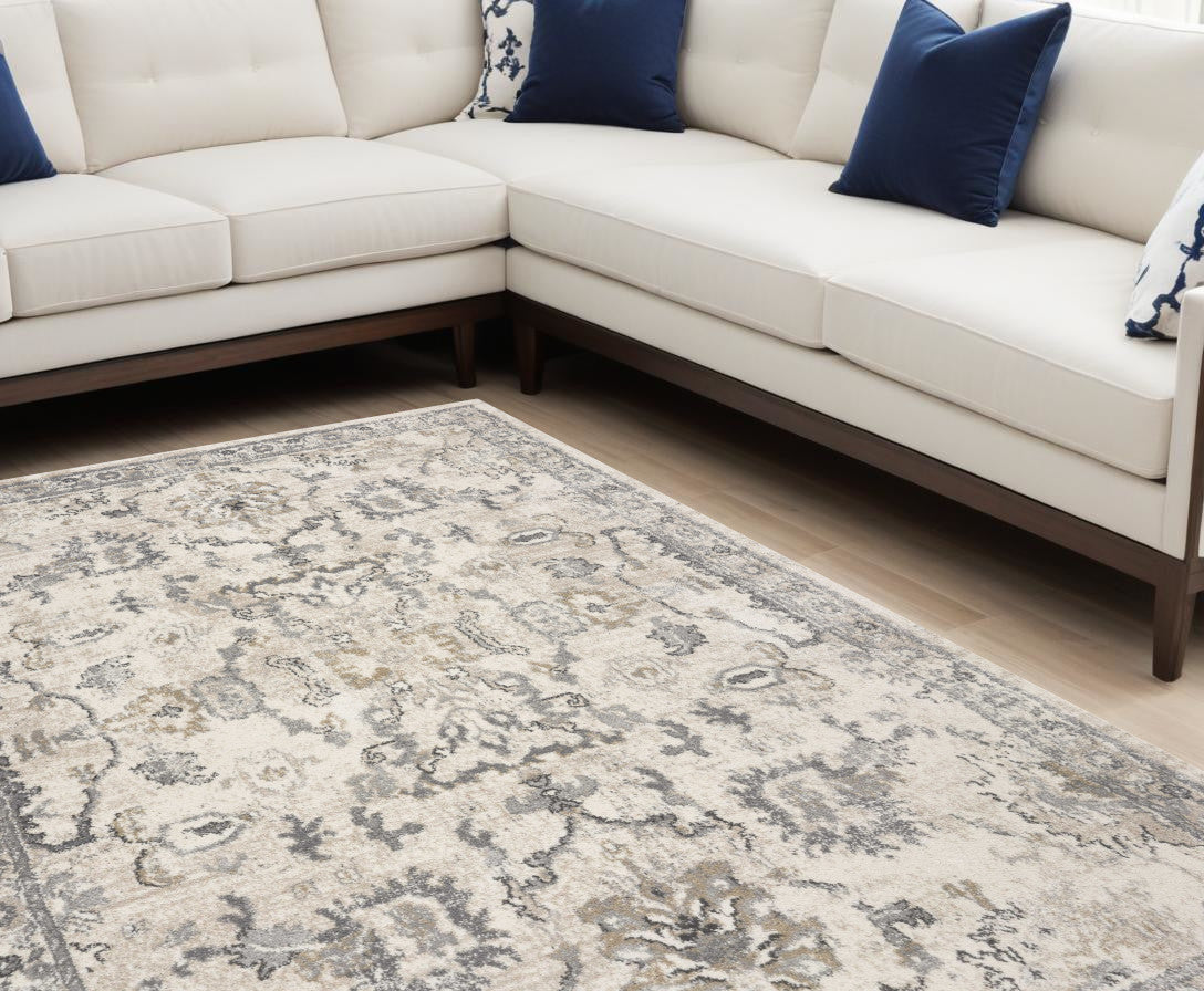 8 x 10 Ivory Machine Woven Distressed Floral Traditional Indoor Rug