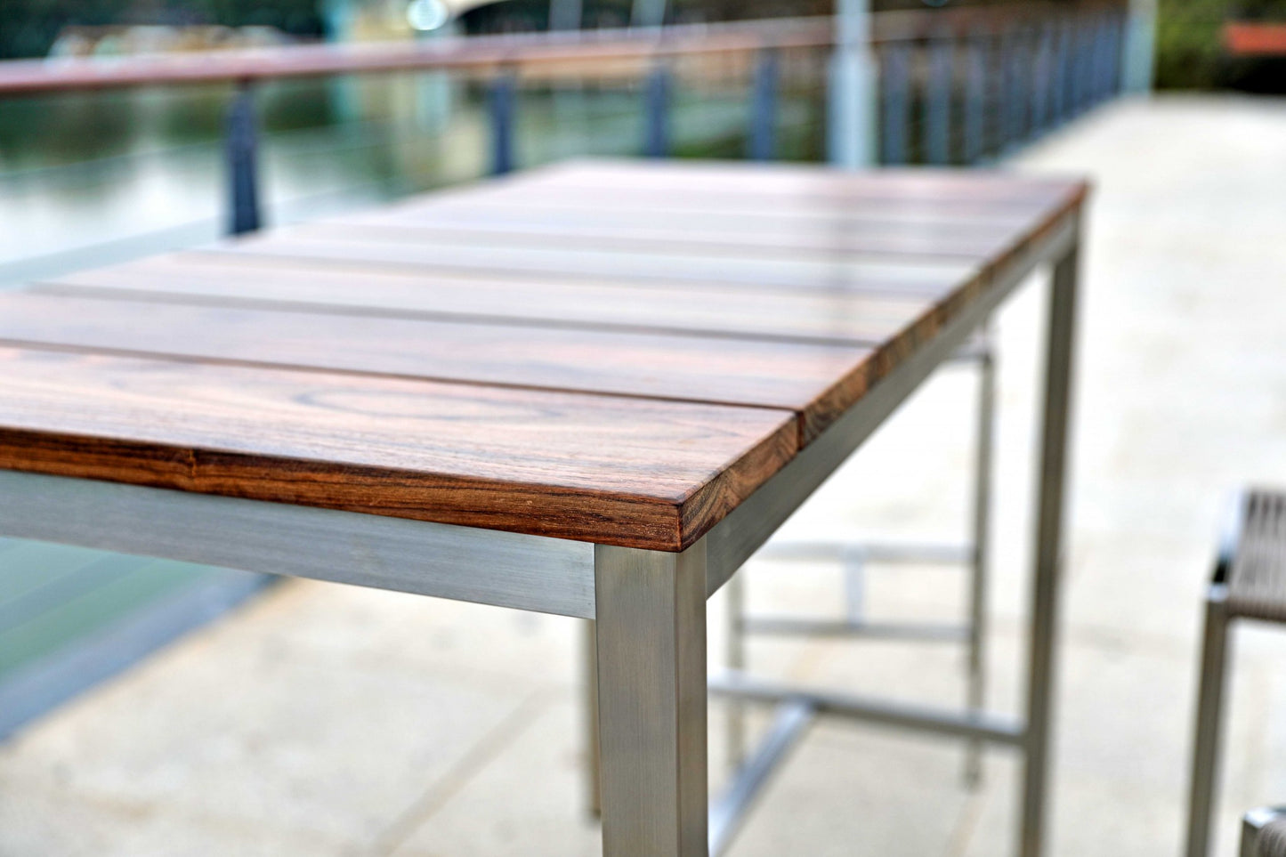 Wood Brown And Silver Solid Wood And Stainless Steel Dining Table