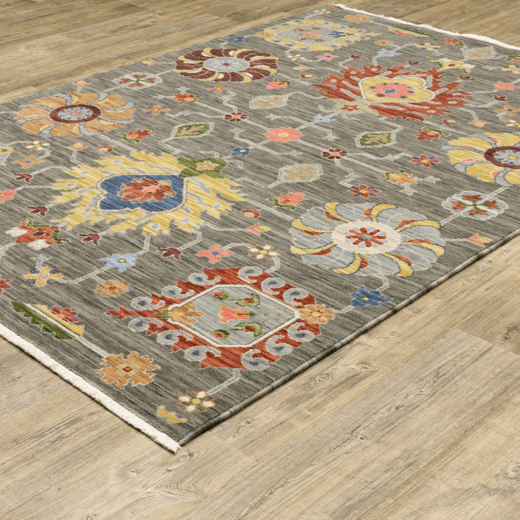 10 x 13 Grey Charcoal Yellow Blue Rust Red Pink Green & Ivory Oriental Power Loom Stain Resistant Rug With Fringe