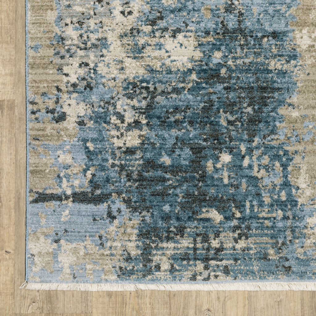 10 x 13 Blue Grey Ivory Light Blue & Dark Blue Power Loom Stain Resistant Rug With Fringe
