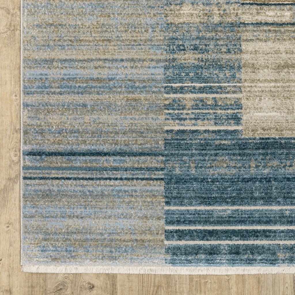 10 x 13 Blue Dark Blue Teal Grey Ivory Beige & Tan Geometric Power Loom Stain Resistant Rug With Fringe
