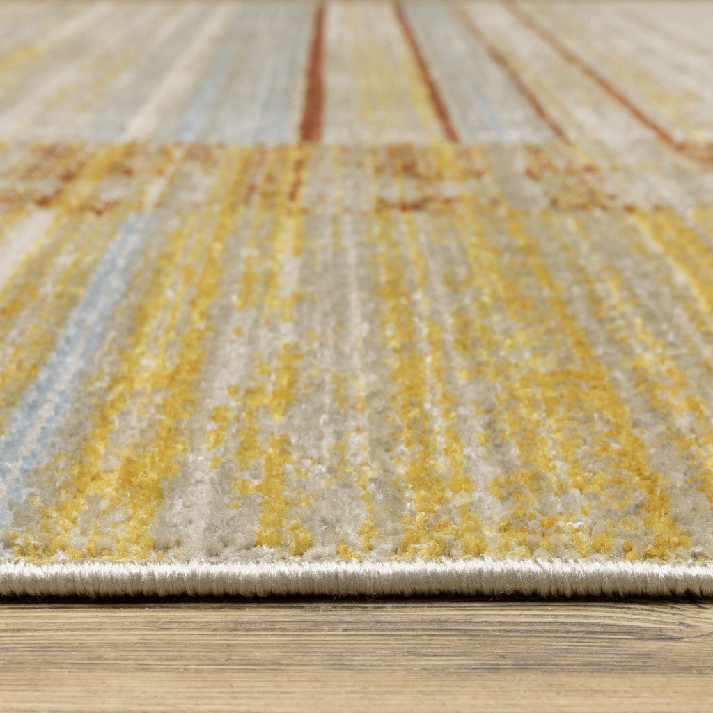10 x 13 Rust Gold Blue Grey Ivory & Tan Geometric Power Loom Stain Resistant Rug With Fringe