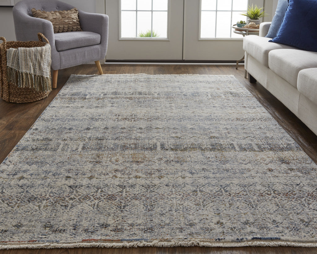 10 x 13 Tan Ivory & Blue Geometric Power Loom Distressed Rug With Fringe