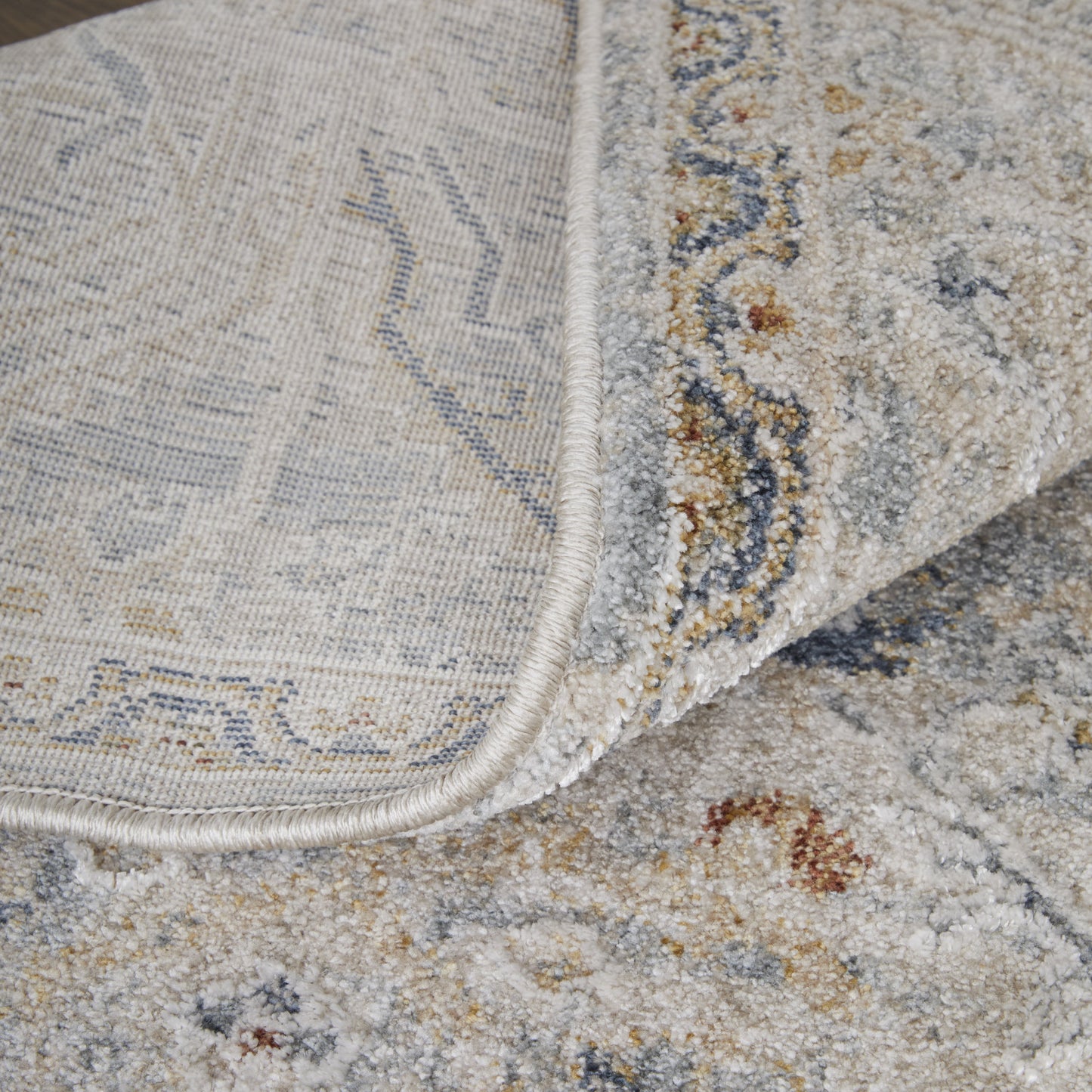 8 x 10 Ivory Tan & Blue Power Loom Rug With Fringe