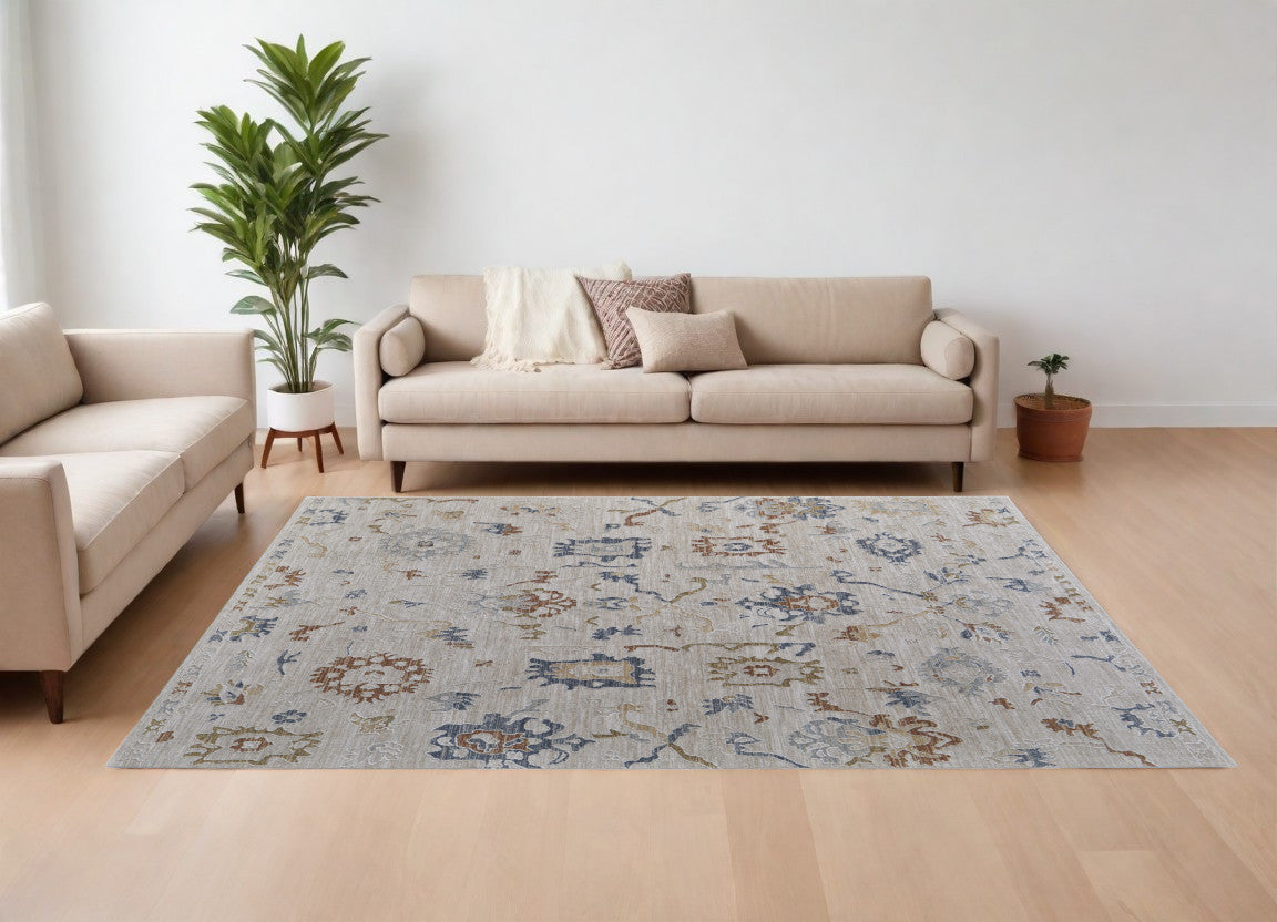 8 x 10 Ivory Blue & Gold Floral Power Loom Rug With Fringe