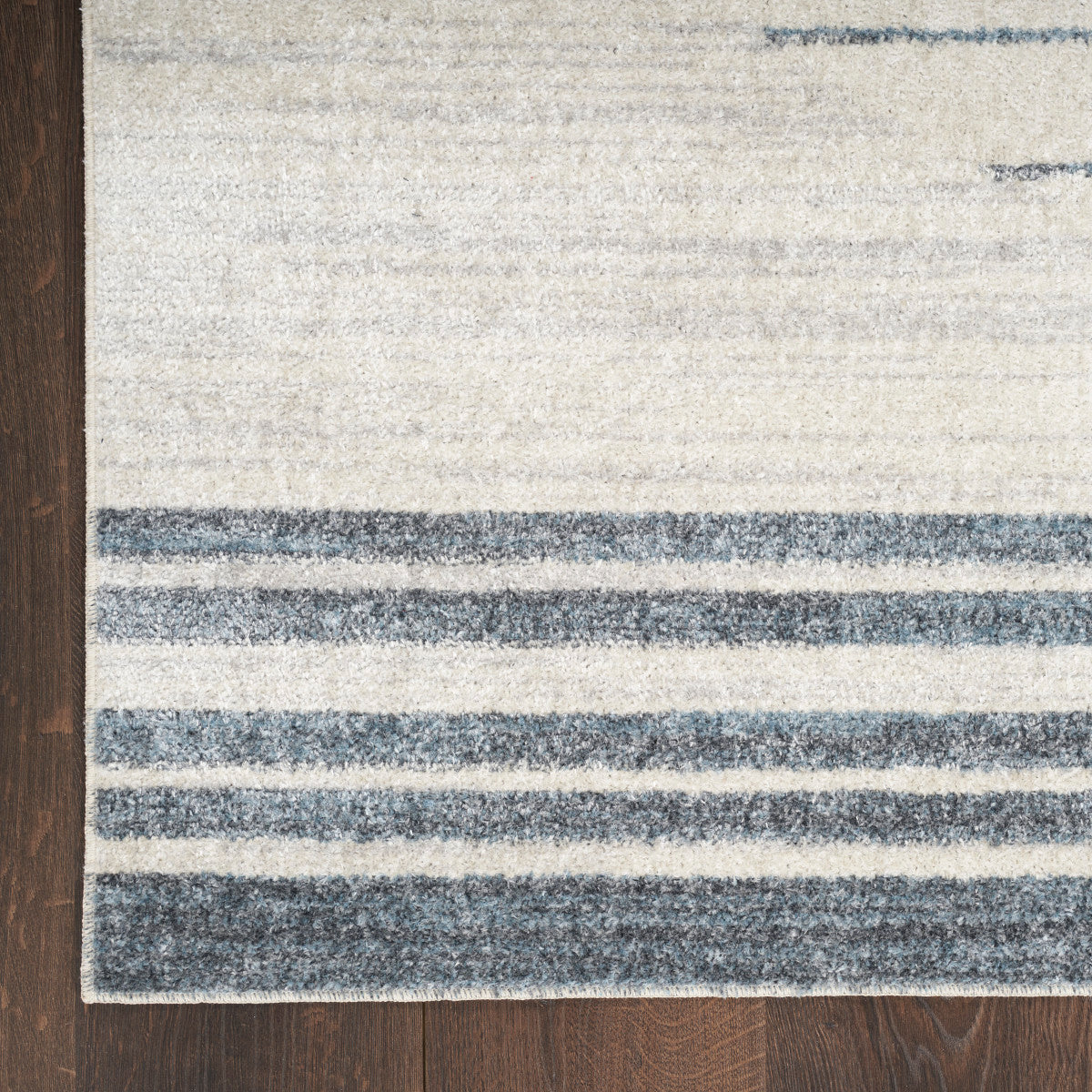 Nourison Astra Ivory & Blue Pet Friendly Machine Washable Rug - Corner