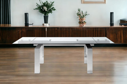 Clear and Silver Glass and Stainless Steel Self-Storing Leaf Dining Table