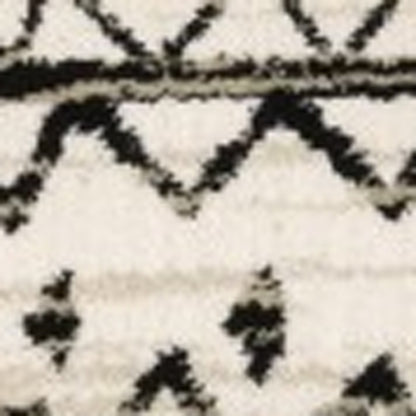 10 x 13 Ivory & Black Eclectic Patterns Indoor Rug