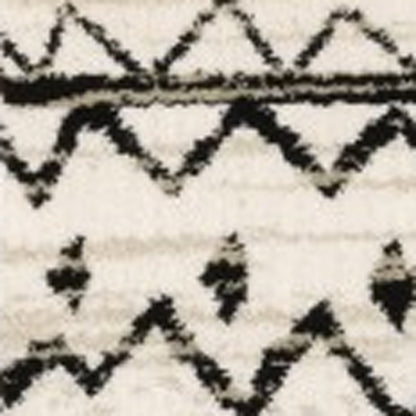 10 x 13 Ivory & Black Eclectic Patterns Indoor Rug