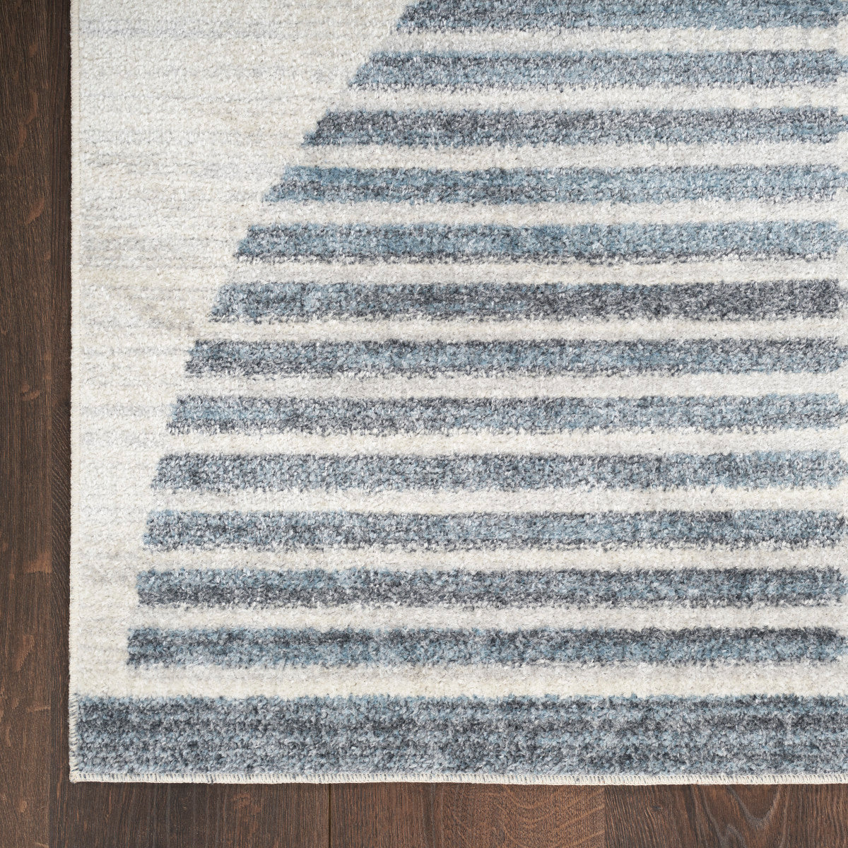 Nourison Astra Ivory & Blue Pet Friendly Machine Washable Rug - Corner