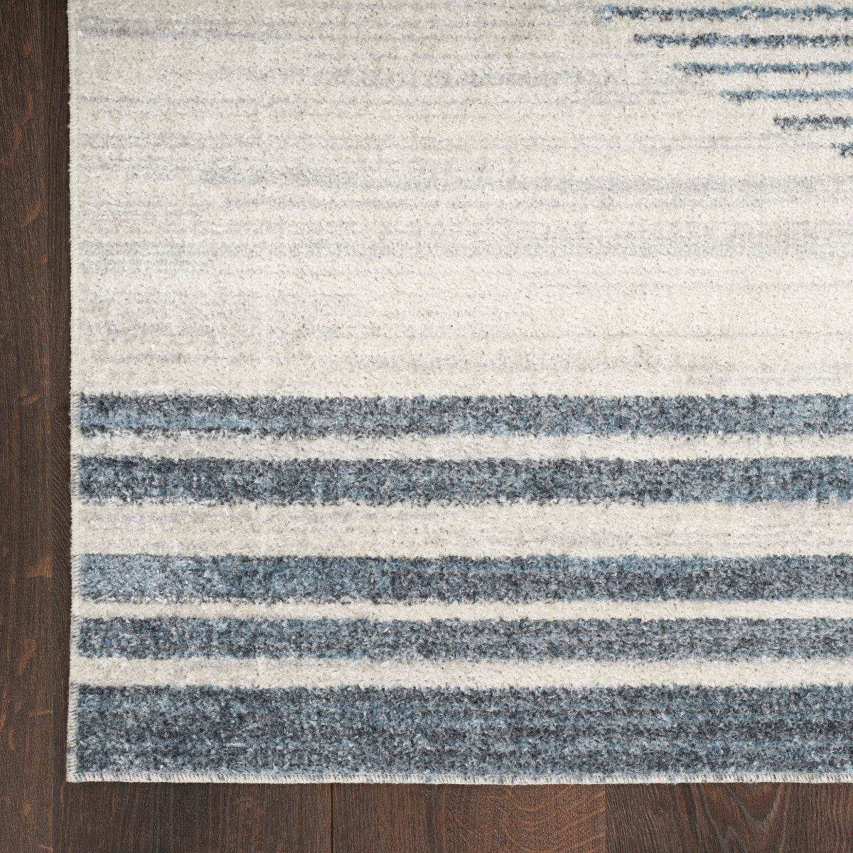 Nourison Astra Ivory & Blue Pet Friendly Machine Washable Rug - Corner