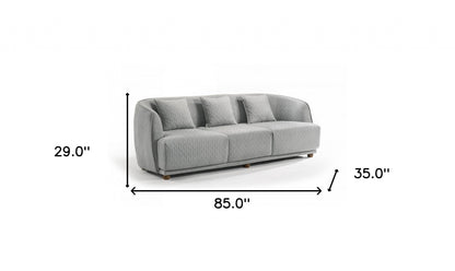Gray Geometric Sofa & Toss Pillows With Brown Legs
