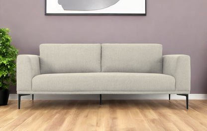 Beige Sofa With Black Legs