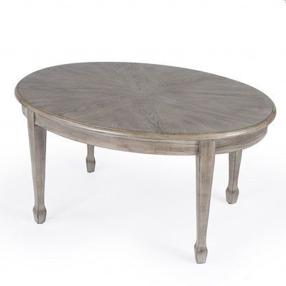 Gray Oval Wood Scoring & Rub Through Coffee Table