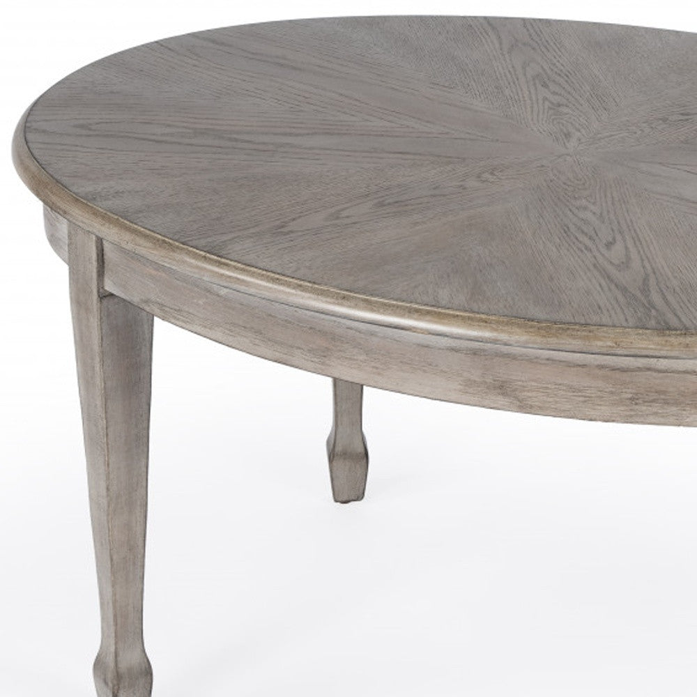 Gray Oval Wood Scoring & Rub Through Coffee Table