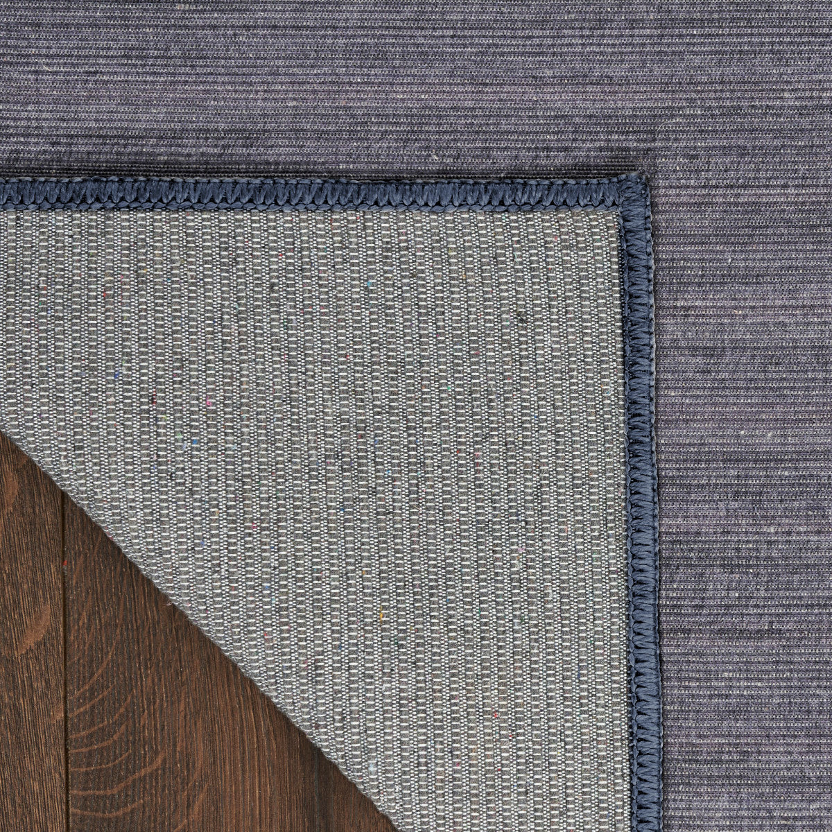 Nourison Essentials Loom Woven Navy Machine Washable Rug - Corner
