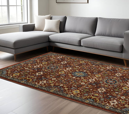 10 x 13 Red Blue Gold & Ivory Oriental Power Loom Stain Resistant Rug With Fringe