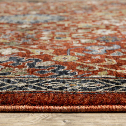 10 x 13 Red Blue Gold & Ivory Oriental Power Loom Stain Resistant Rug With Fringe