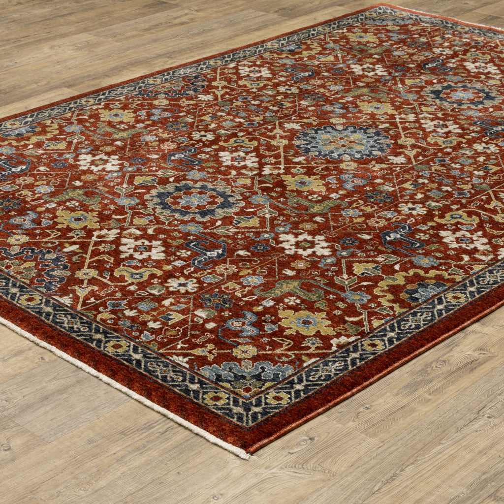 10 x 13 Red Blue Gold & Ivory Oriental Power Loom Stain Resistant Rug With Fringe