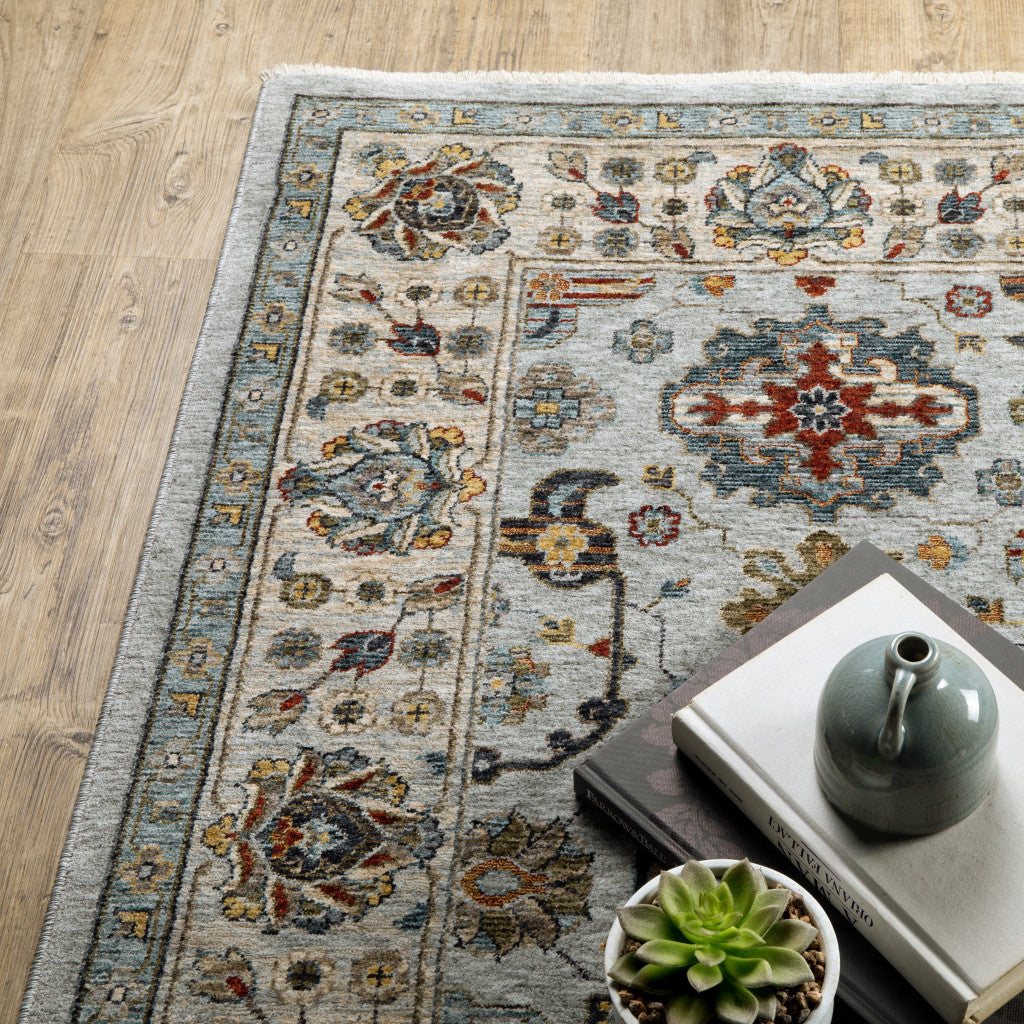 10 x 13 Blue Beige Grey Green Yellow & Rust Oriental Power Loom Stain Resistant Rug With Fringe