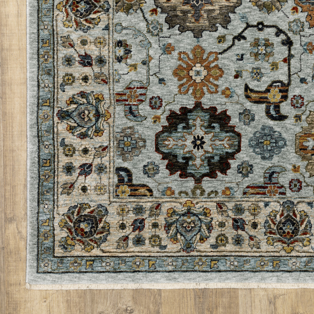 10 x 13 Blue Beige Grey Green Yellow & Rust Oriental Power Loom Stain Resistant Rug With Fringe
