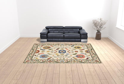 10 x 13 Ivory Green Blues Pink Yellow Rust Brown Tan & Grey Oriental Power Loom Stain Resistant Rug With Fringe