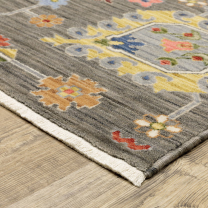 10 x 13 Grey Charcoal Yellow Blue Rust Red Pink Green & Ivory Oriental Power Loom Stain Resistant Rug With Fringe