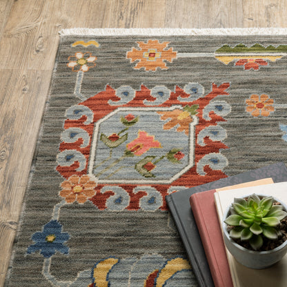 10 x 13 Grey Charcoal Yellow Blue Rust Red Pink Green & Ivory Oriental Power Loom Stain Resistant Rug With Fringe