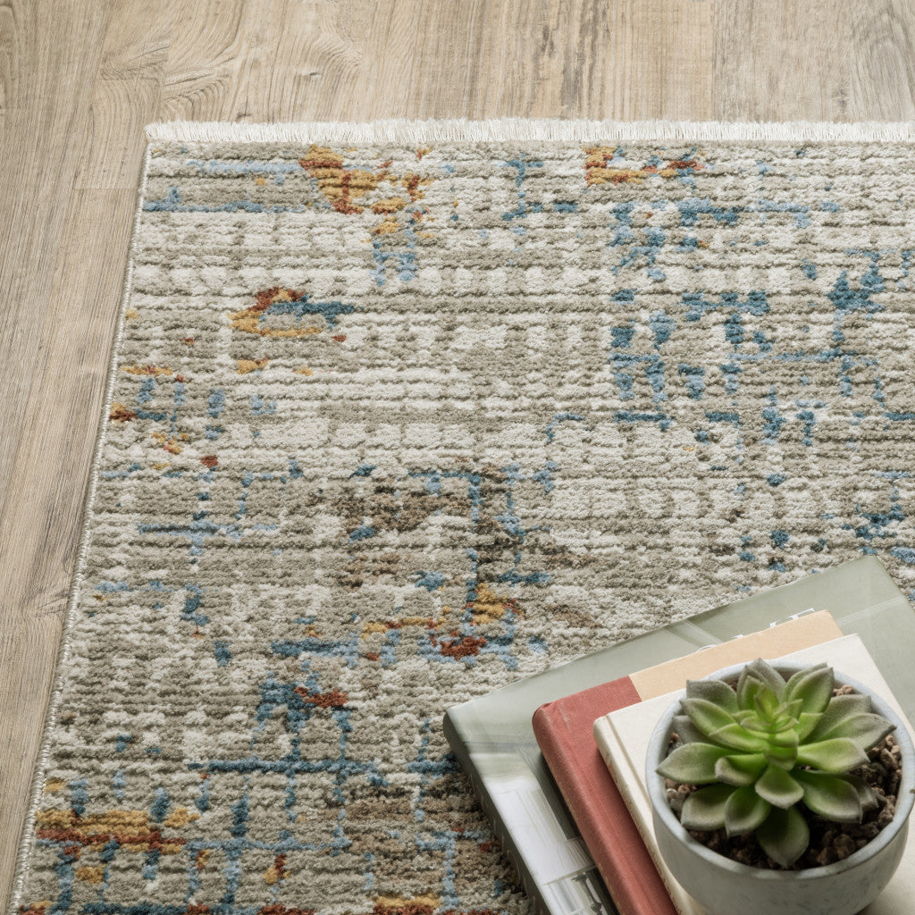 10 x 13 Beige Grey Brown Gold Red & Blue Power Loom Stain Resistant Rug With Fringe