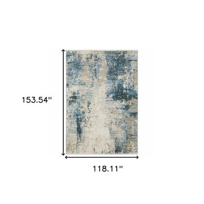 10 x 13 Blue Grey Ivory Light Blue & Dark Blue Power Loom Stain Resistant Rug With Fringe