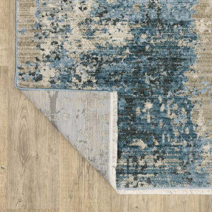 10 x 13 Blue Grey Ivory Light Blue & Dark Blue Power Loom Stain Resistant Rug With Fringe