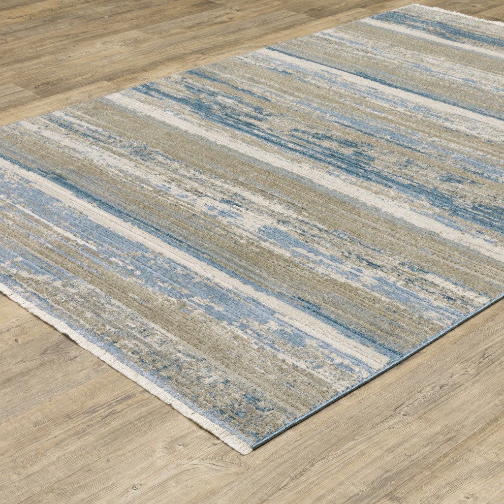 10 x 13 Ivory Beige Grey Blue & Tan Power Loom Stain Resistant Rug With Fringe