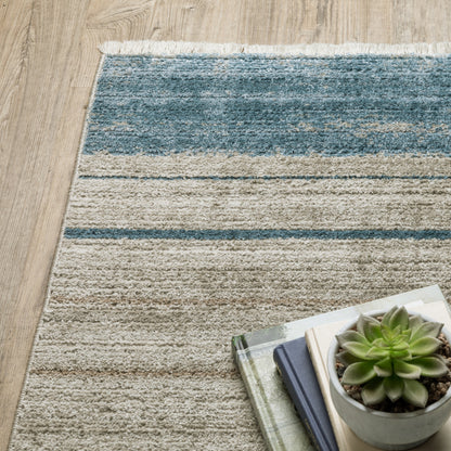 10 x 13 Blue Dark Blue Teal Grey Ivory Beige & Tan Geometric Power Loom Stain Resistant Rug With Fringe