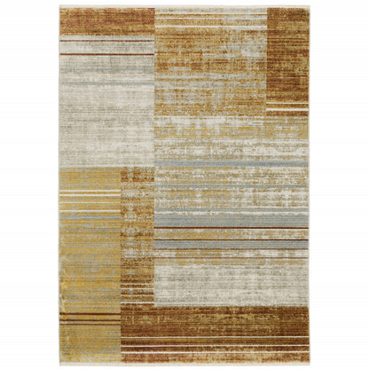 10 x 13 Rust Gold Blue Grey Ivory & Tan Geometric Power Loom Stain Resistant Rug With Fringe