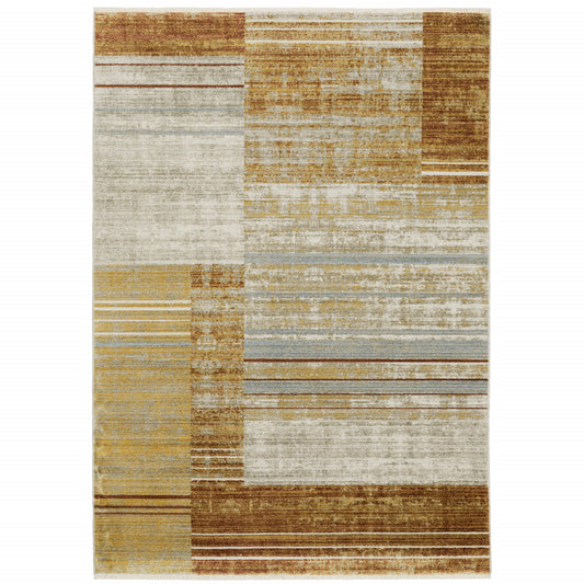 10 x 13 Rust Gold Blue Grey Ivory & Tan Geometric Power Loom Stain Resistant Rug With Fringe
