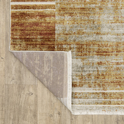 10 x 13 Rust Gold Blue Grey Ivory & Tan Geometric Power Loom Stain Resistant Rug With Fringe