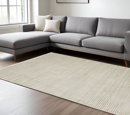 10 x 13 Ivory Beige Taupe & Tan Geometric Power Loom Stain Resistant Rug With Fringe