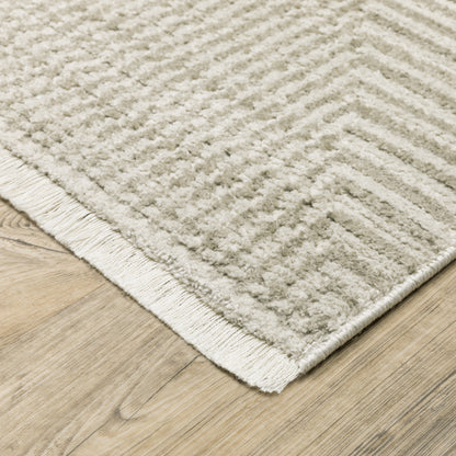 10 x 13 Ivory Beige Taupe & Tan Geometric Power Loom Stain Resistant Rug With Fringe