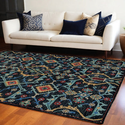 9 x 12 Blue Yellow & Red Wool Floral Hand Knotted Distressed Stain Resistant Rug With Fringe