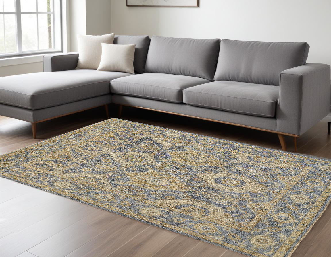 8 x 10 Blue Gold & Tan Wool Floral Hand Knotted Stain Resistant Rug With Fringe