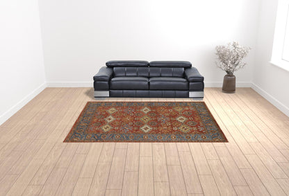 9 x 12 Red Blue & Orange Wool Floral Hand Knotted Stain Resistant Rug With Fringe