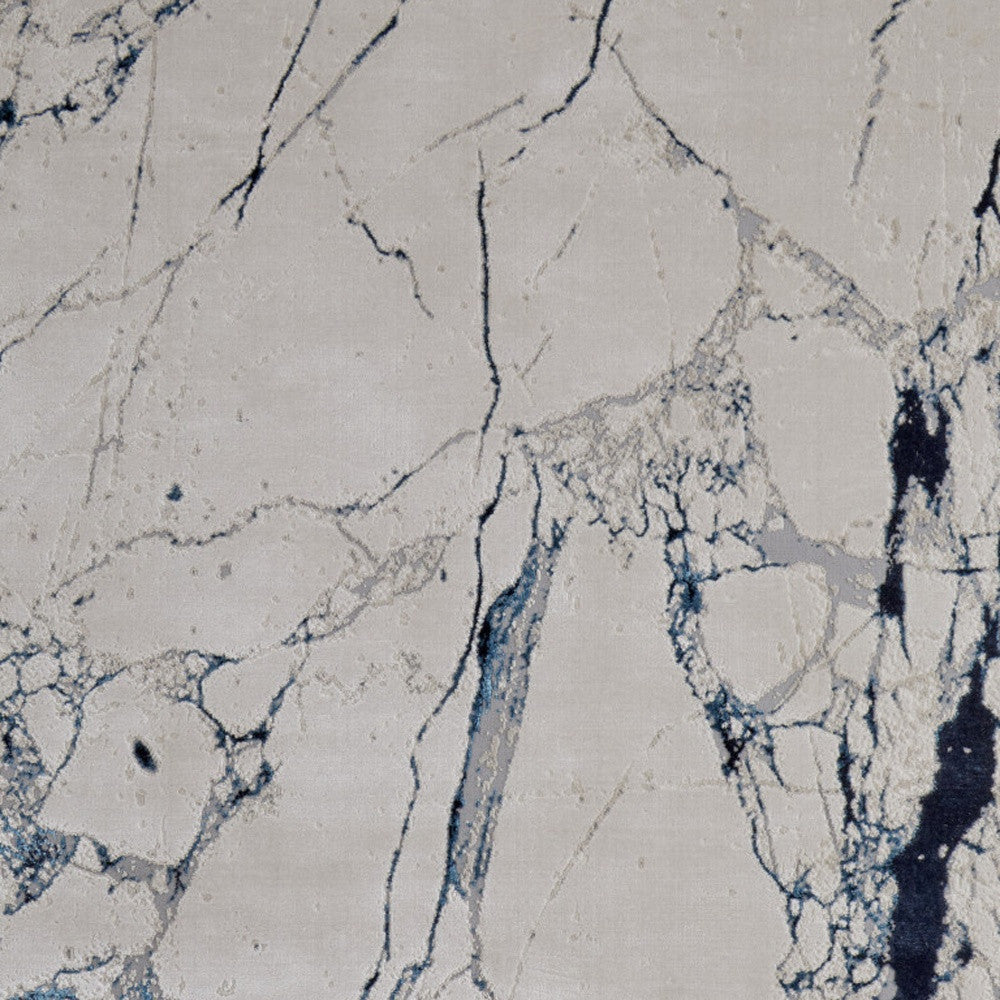 10 x 13 Ivory & Blue Marble Power Loom Distressed Rug