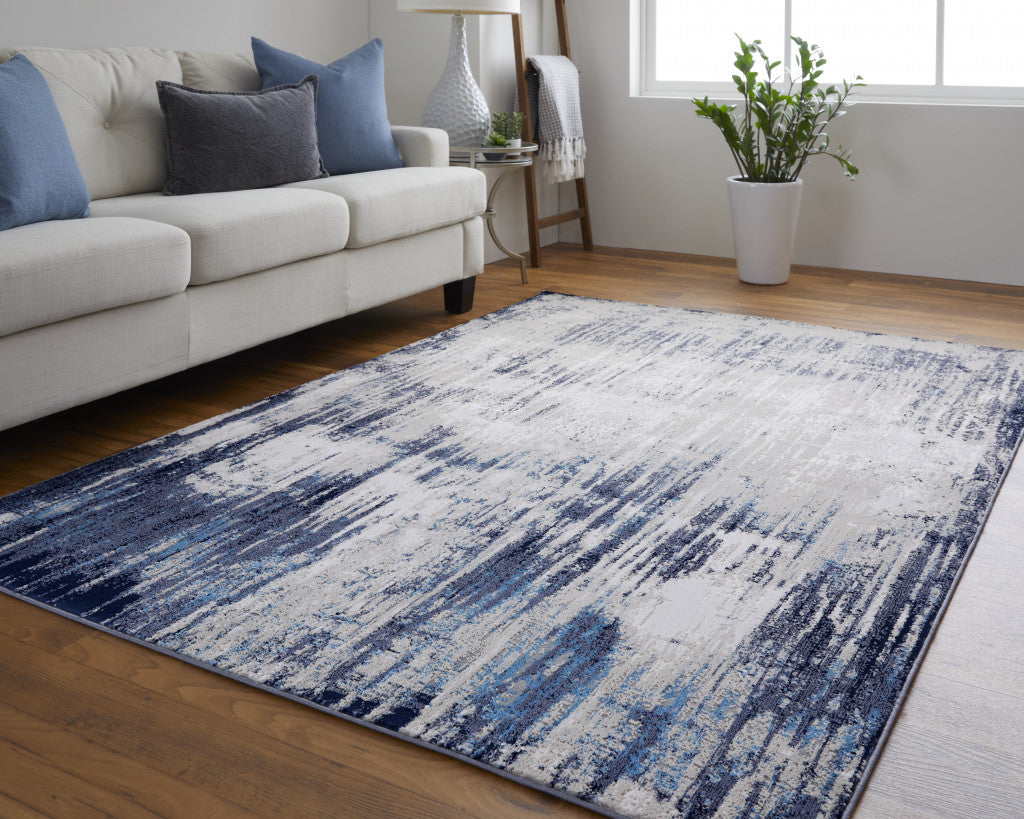 10 x 13 Tan Blue & Ivory Power Loom Distressed Rug