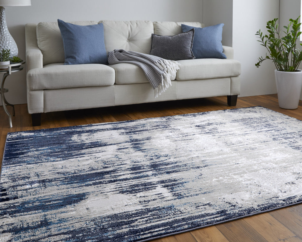 10 x 13 Tan Blue & Ivory Power Loom Distressed Rug