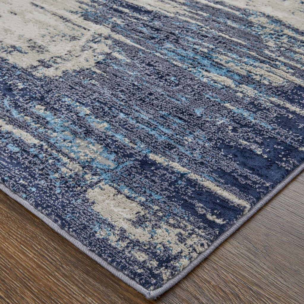 10 x 13 Tan Blue & Ivory Power Loom Distressed Rug