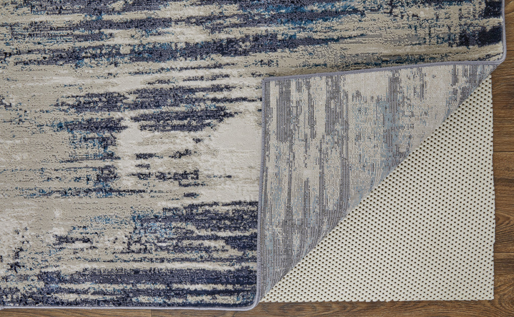 10 x 13 Tan Blue & Ivory Power Loom Distressed Rug