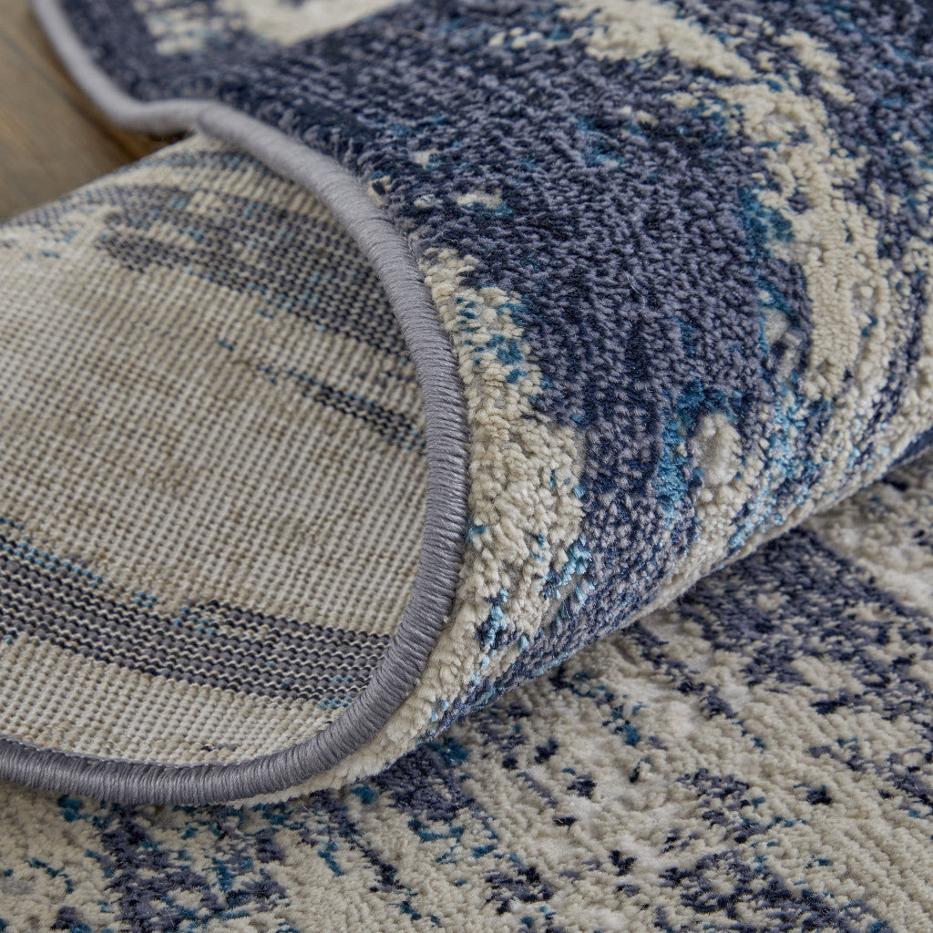10 x 13 Tan Blue & Ivory Power Loom Distressed Rug