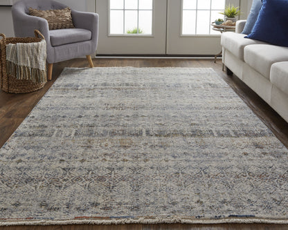 10 x 13 Tan Ivory & Blue Geometric Power Loom Distressed Rug With Fringe