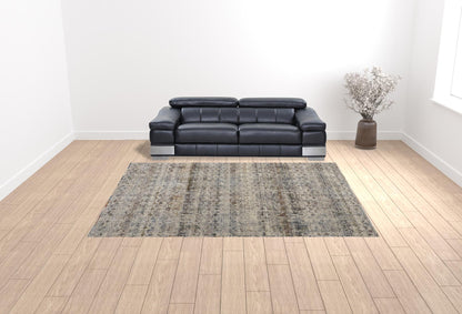 10 x 13 Tan Ivory & Blue Geometric Power Loom Distressed Rug With Fringe
