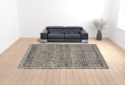 12 x 15 Tan Blue & Orange Floral Power Loom Distressed Rug With Fringe